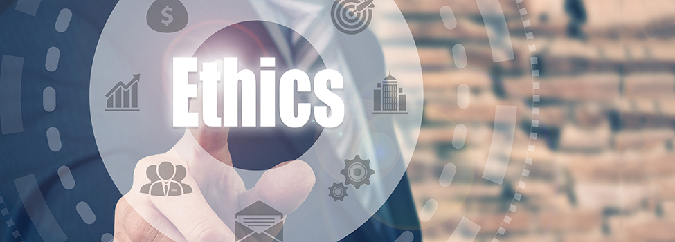 Businessman pressing an Ethics concept button.